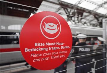 Hinweis auf das Tragen einer Nase-Mund-Bedeckung