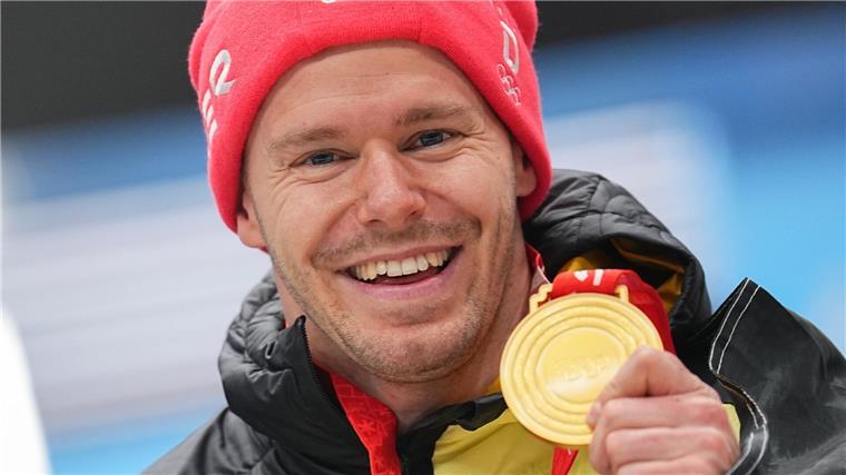 Skeleton-Olympiasieger Grotheer: Olympia 2026 letztes Ziel Alles erreicht: Christopher Grotheer nach seinem Olympiasieg 2022 in Peking.