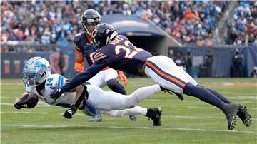Amon-Ra St. Brown (l) fing bei den Bears den elften Touchdown der Saison.