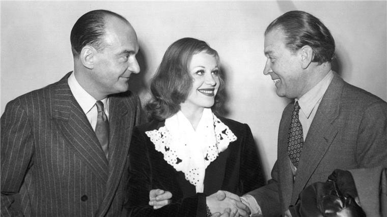 Anlässlich der Premiere des Films „Die Sünderin“ treffen sich der österreichische Regisseur Willi Forst (l-r), die Hauptdarstellerin Hildegard Knef und der Schauspieler Gustav Fröhlich. 