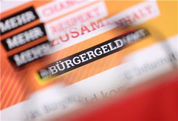 «Bürgergeld» ist auf der Homepage des Bundesministeriums für Arbeit und Soziales durch eine Brille zu lesen.