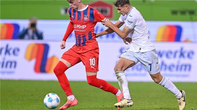 Nullnummer in Heidenheim: Torlos gegen Hoffenheim Der 1. FC Heidenheim um Paul Wanner (l) und die TSG 1899 Hoffenheim um Tom Bischof (r) kamen erst nach der Pause offensiv in Schwung.