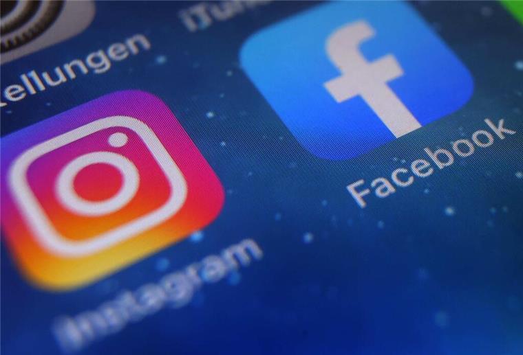 Facebook und Instagram führen kostenpflichtiges Abo ein Auf dem Bildschirm eines Smartphones sind die Icons von Instagram, Facebook und WhatsApp zu sehen.
