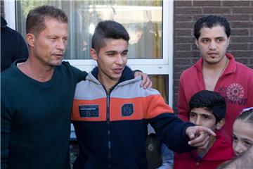 Der Schauspieler Til Schweiger (links) setzt sich für die Integration von Flüchtlingen ein.