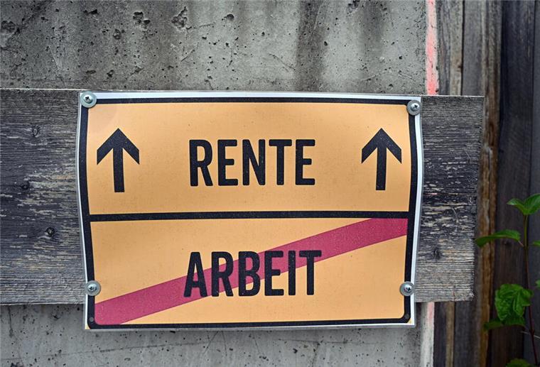 Frührente mit 59: So gehst du viel früher abschlagfrei in Rente Ein Schild, an ein deutsches Orstausgangsschild angelehnt, Raus aus der Arbeit, Rente voraus.