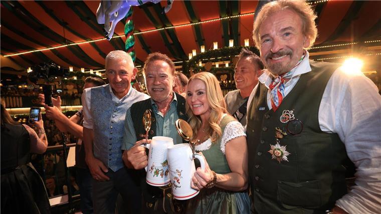 Wer sind die Wiesn-Promis? Die bekannte Riege der Wiesn-Promis - mit Schwarzenegger und Gottschalk.
