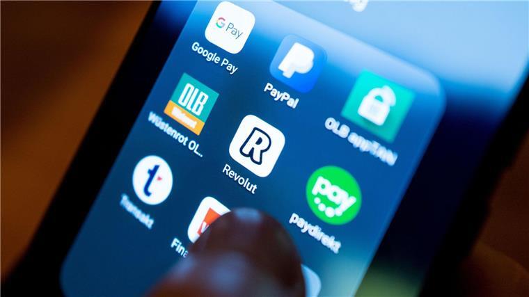 Die britische Digitalbank Revolut startet ein eigenes vollständiges Mobilfunkangebot. (Symbolbild).