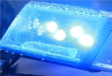 Streifenwagen mit Blaulicht