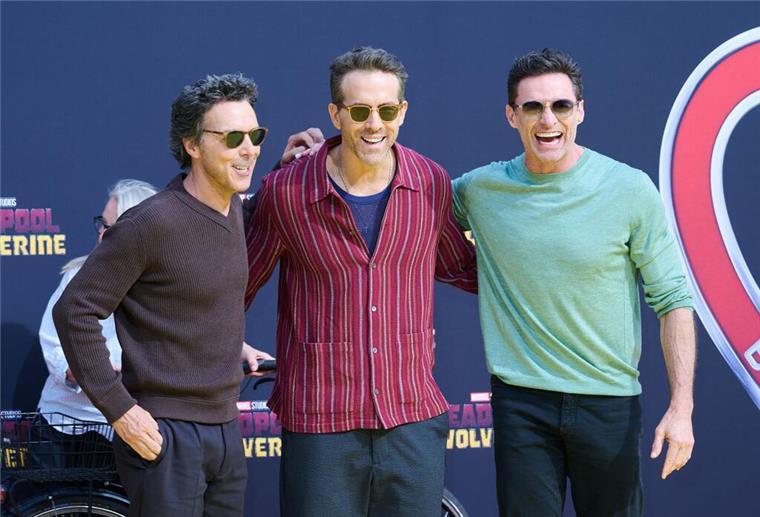 Wie Ryan Reynolds und Hugh Jackman Marvel beleben Drei Freunde: Shawn Levy (l-r), Ryan Reynolds und Hugh Jackman