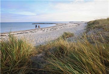 Ein Strand in Schleswig-Holstein. Hier leben zufriedene Menschen.