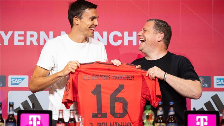 Freuen sich sichtlich auf die Zusammenarbeit: João Palhinha (l) und Max Eberl.