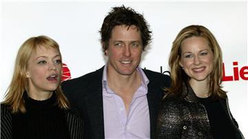 Heike Makatsch, Hugh Grant und Laura Linney (l-r) bei der Premiere 2003 in München.