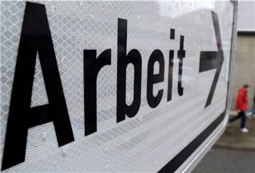 Schild mit der Aufschrift Arbeit