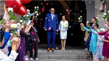 Jetzt auch verheiratet: Bremens Bürgermeister Andreas Bovenschulte und Kerstin Krüger.