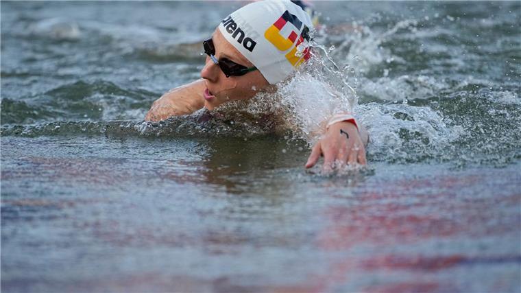 Nach Rennen in der Seine: Drei deutsche Schwimmer erkrankt Leonie Beck berichtet von Krankheitssymptomen nach ihrem Rennen in der Seine.
