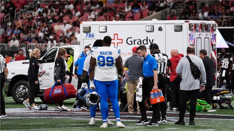 NFL-Spieler erzwingen Abbruch nach Verletzung eines Profis Lions-Profi Morice Norris musste mit dem Krankenwagen vom Spielfeld transportiert werden.