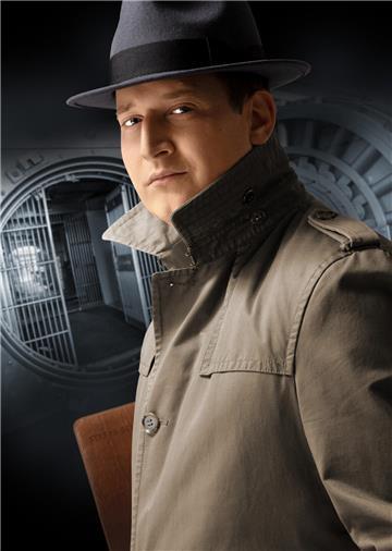 Mann im Trenchcoat mit Stetson Hut