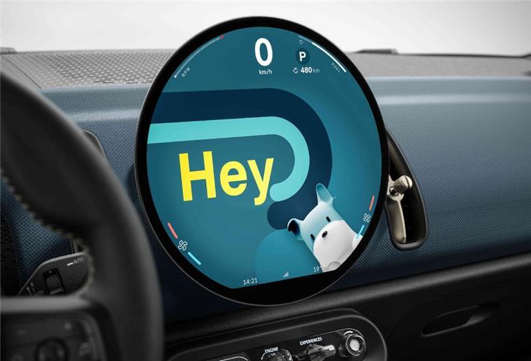 Moderne trifft Ikone: Die neue MINI Family ist da Ein rundes Display mit farbigem Hintergrund im MINI