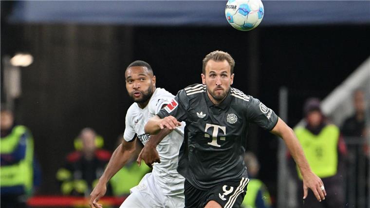 Defensive Leverkusener zufrieden: „Nicht immer Tiki-Taka“ Nationalspieler Jonathan Tah (links) hielt Bayerns Edel-Offensive um Harry Kane in Schach.