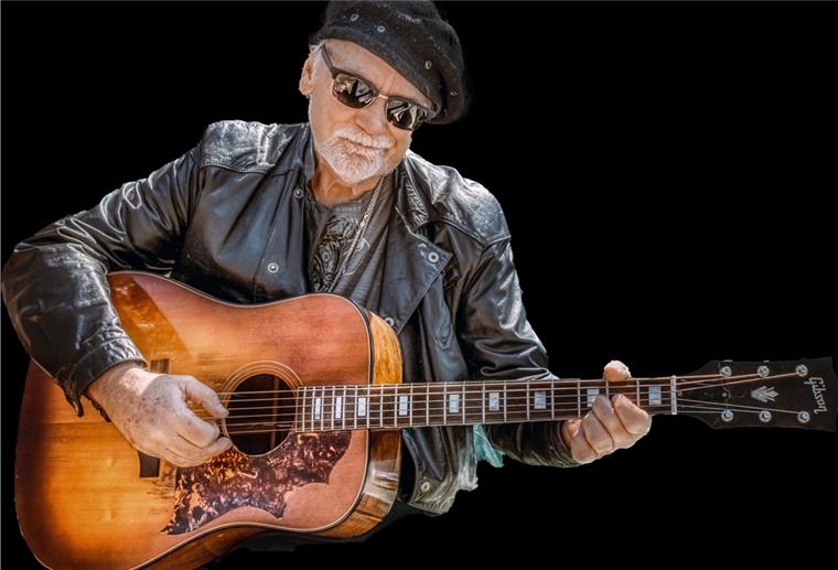 Bluesmusik im Theater im Fischereihafen Musiker mit Brille und Gitarre