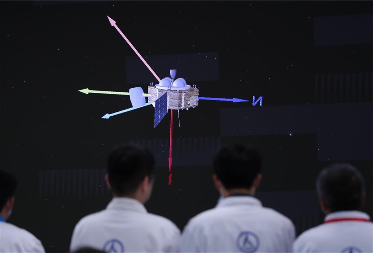 Chinesischer Rover landet auf dem Mars Technisches Personal arbeitet im Raumfahrtkontrollzentrum in Peking. Chinas erster Mars-Rover ist auf dem roten Planeten gelandet. Es ist das erste Mal, dass China eine Sonde auf einem anderen Planeten als der Erde gelandet hat.