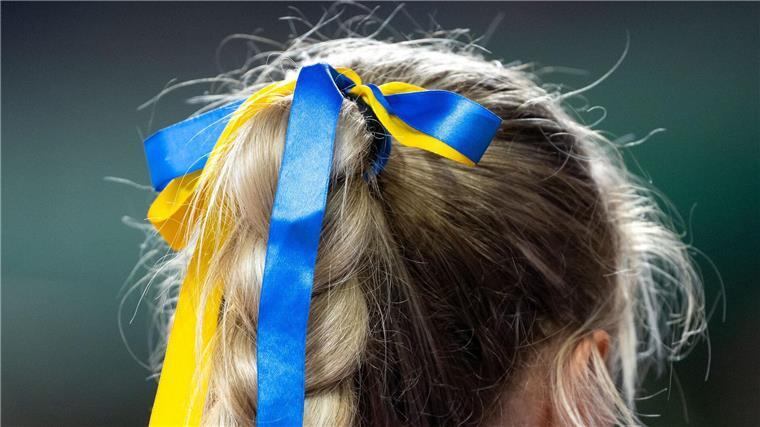 In Zeiten des Krieges: Ukrainer und Russen bei Olympia Ukrainische Sportler sehen ihre Olympia-Teilnahme als starkes Zeichen im Krieg.