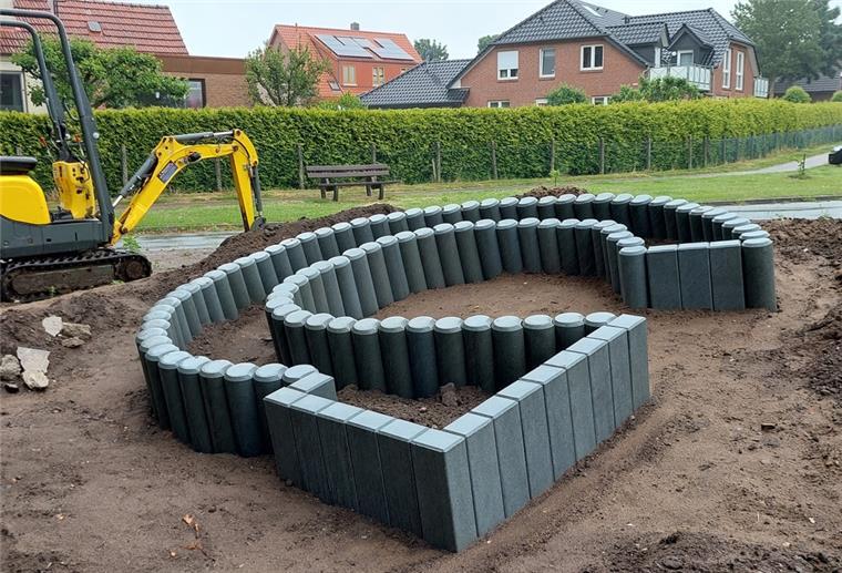 Langen: Und plötzlich wächst da ein großes „G“ aus dem Boden Was hat es mit dem großen „G“ an der Brückenstraße in Langen auf sich?