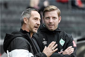 Werder-Coach Florian Kohfeldt (rechts) und SGE-Trainer Adi Hütter treffen mit ihren Teams innerhalb von 48 Stunden zweimal aufeinander.
