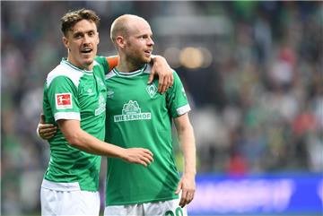 Werders Max Kruse (links) und Davy Klaassen freuen sich über den Sieg gegen Mainz. 