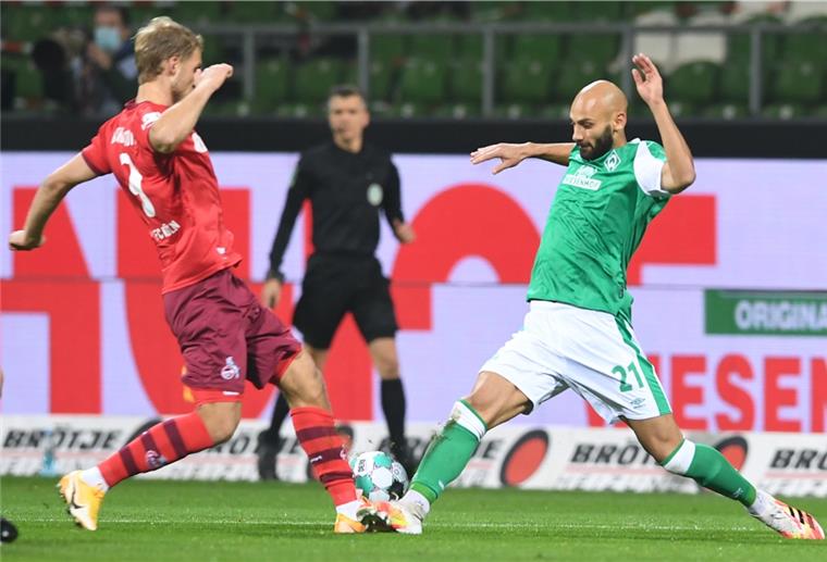Werders Ömer Toprak (rechts) im Zweikampf mit Kölns Sebastian Andersson.