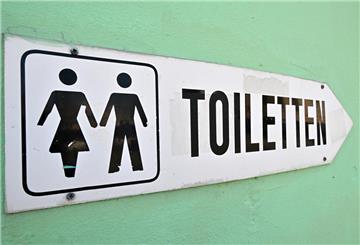 Ein Schild, das auf eine Toilette hinweist
